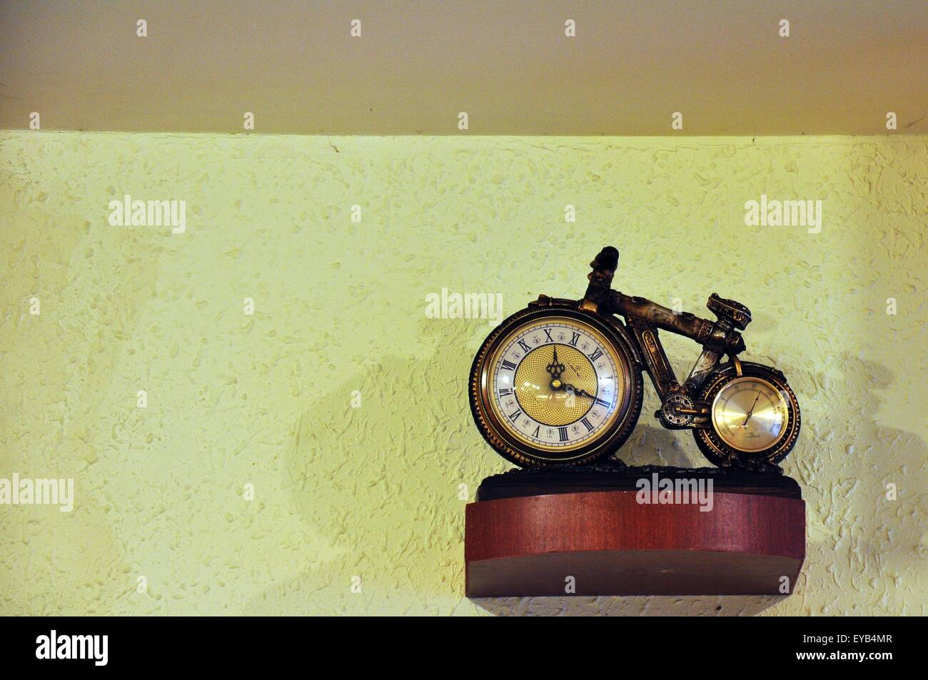bicycle clock hanging on the wall in the restaurant Stock Photo Alamy