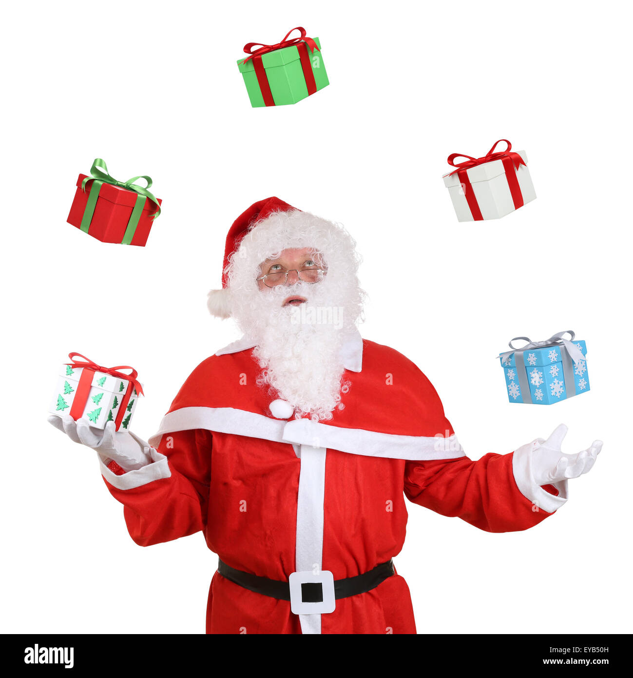 Santa Claus throwing Christmas gifts isolated on a white background