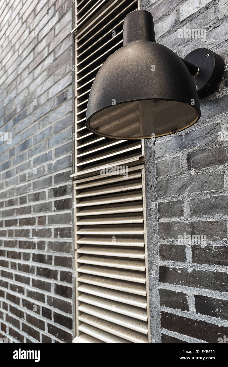 Modern Outdoor Lamp Light Mounted on Brick Wall, Exterior Lighting Equipment Stock Photo