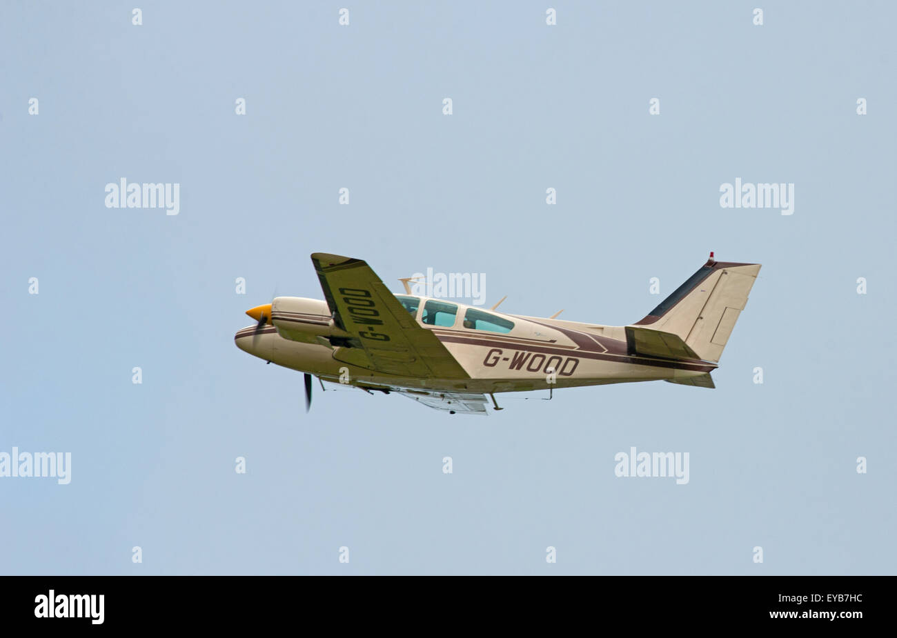 Beechcraft Baron B5595 Twin prop engined light aircraft leaving