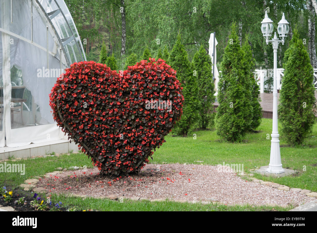 Big Heart (topiary figure) of fresh flowers Stock Photo Alamy