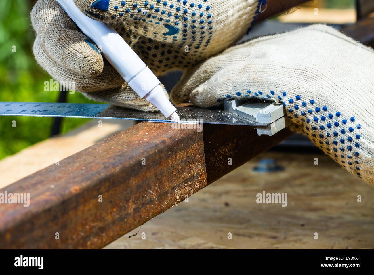 marking rusty metal square pipe for cutting Stock Photo Alamy