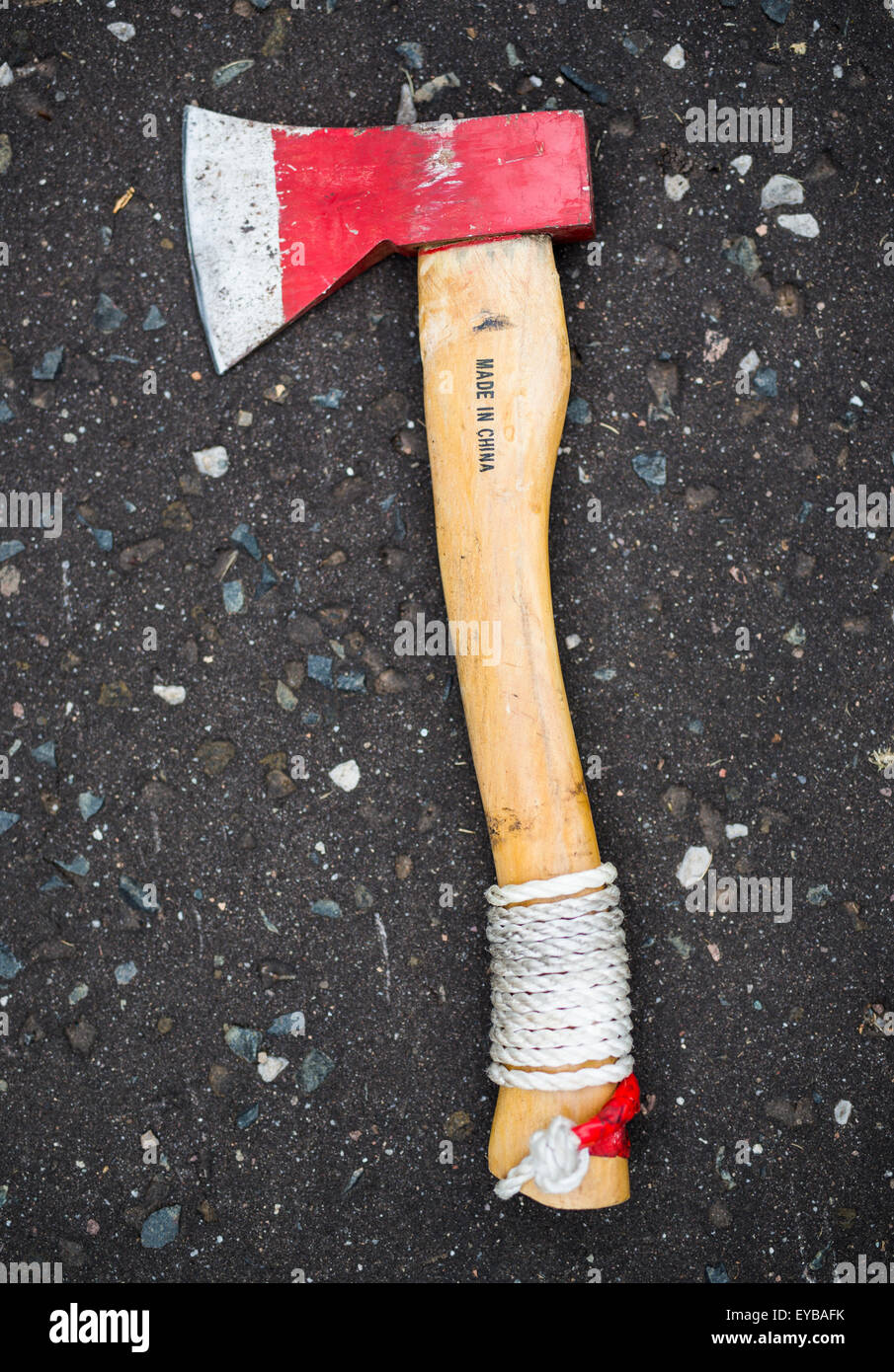 An Axe lies on the pavement, Stock Photo