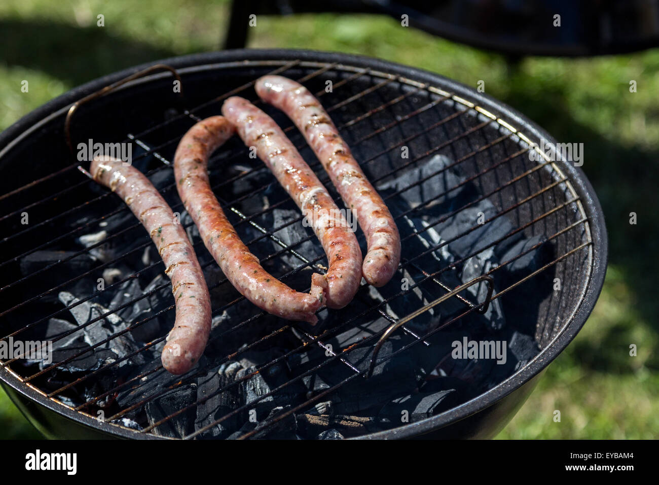 hot grill sausage barbeque on lattice above charcoal Stock Photo Alamy