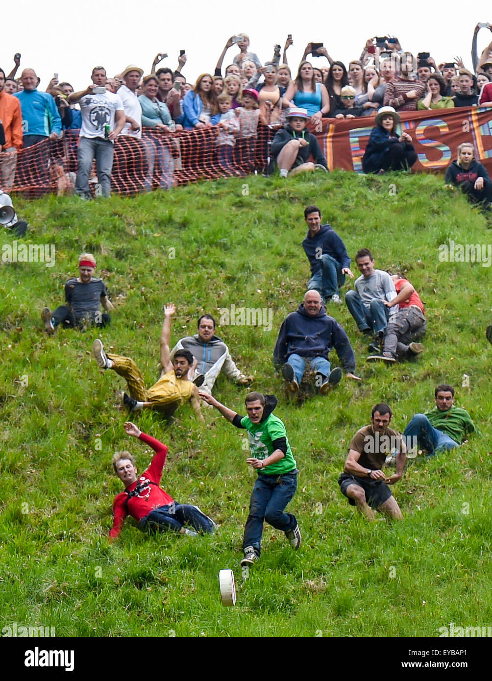 Annual Cheese Rolling at Cooper's Hill in Gloucestershire where people