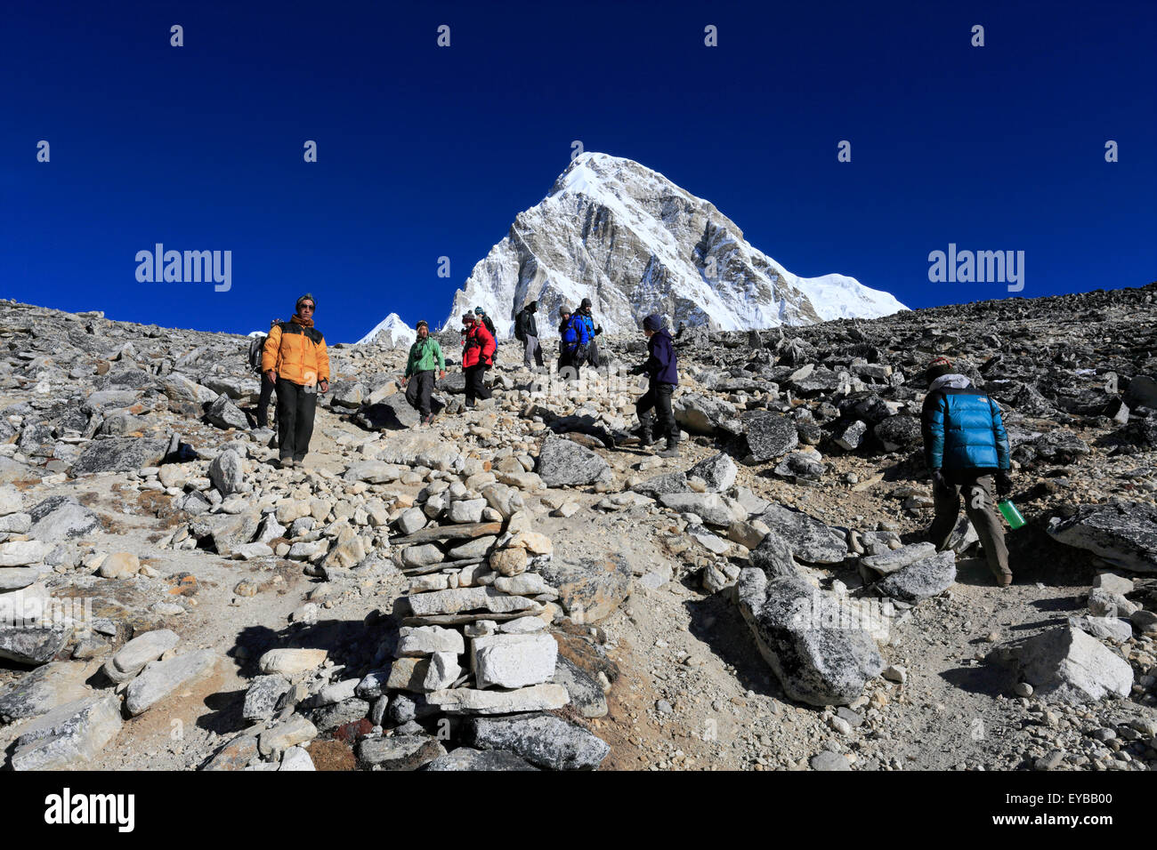 Adult Trekkers walking up Kala Patthar mountain, UNESCO World Heritage Site, Sagarmatha National Park, Solu-Khumbu district, Stock Photo