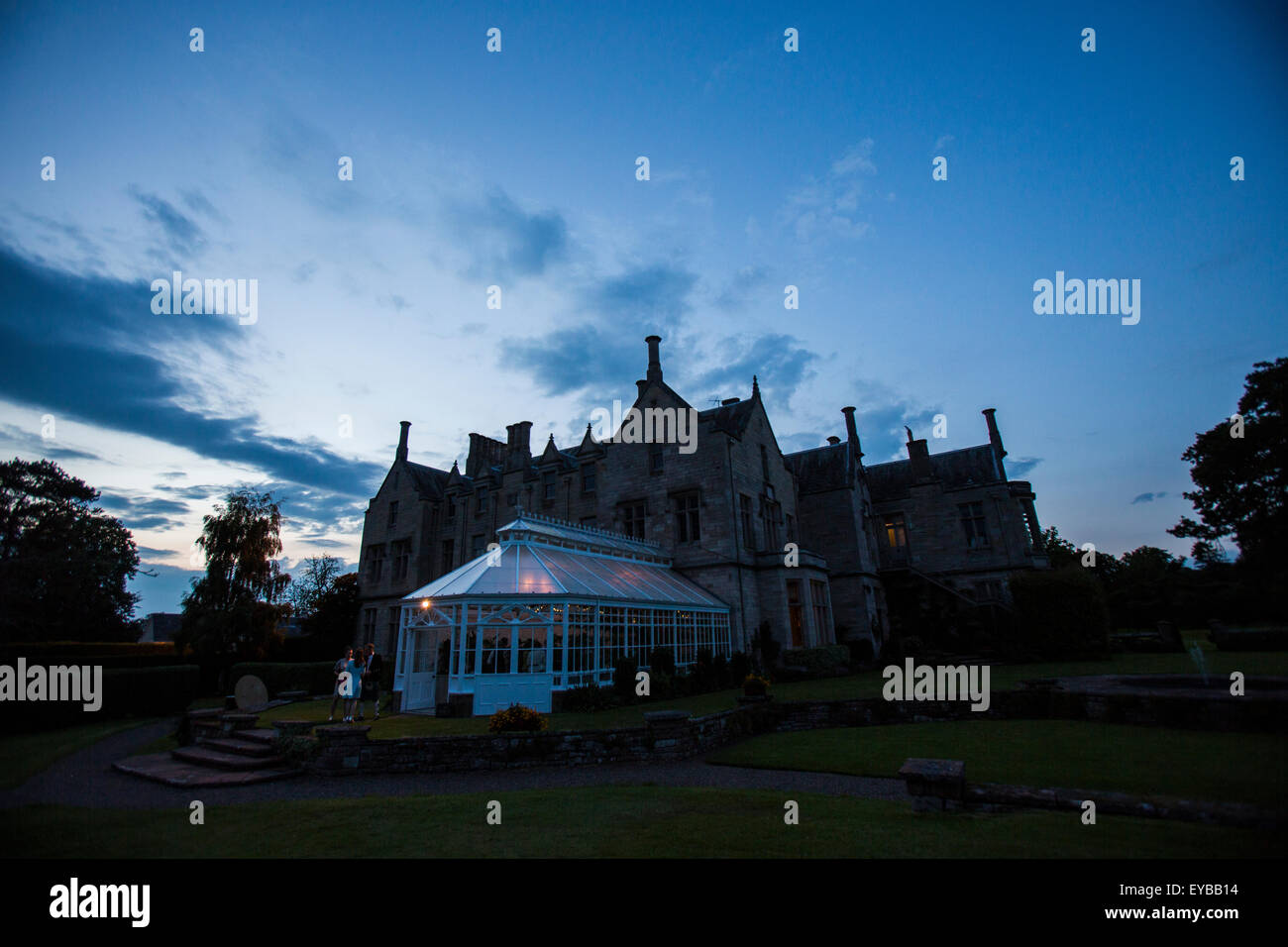 Dramatic view of the Roxburghe Hotel in Kelso, Scotland during a summer wedding celebration