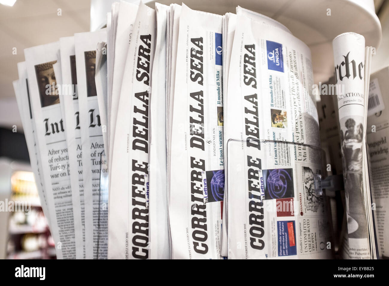 A selection of foreign newspapers on sale Stock Photo