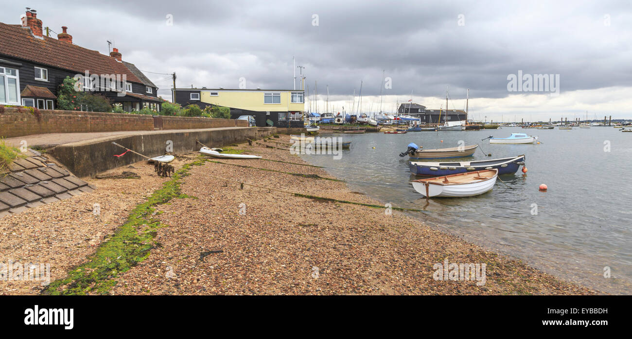 Boats at low tide at West Mersea, Mersea Island, near Colchester, Essex