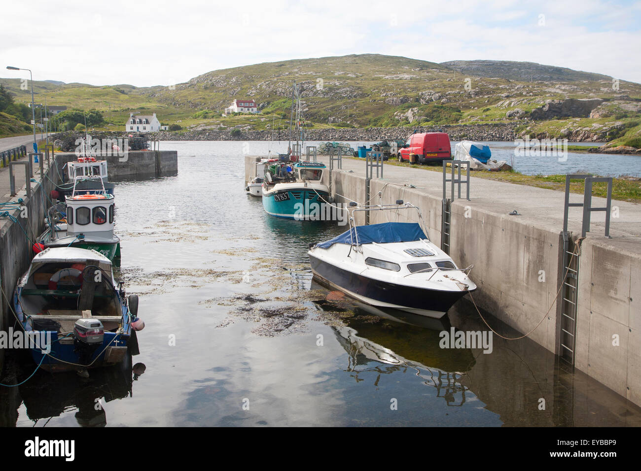 Small fishing boats in harbour at Northbay, Barra, Outer Hebrides, Scotland, UK Stock Photo