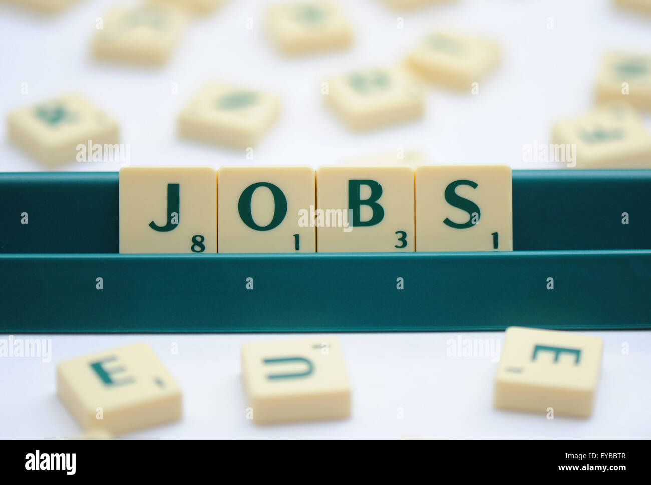 Scrabble keys spelling out the word 'jobs'. Stock Photo