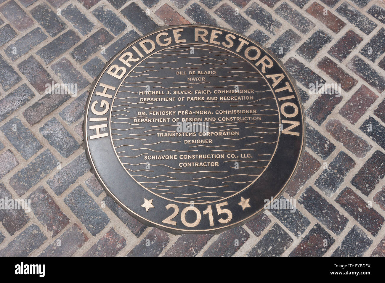Bronze medallion in the walkway of the High Bridge connecting Manhattan with the Bronx over the Harlem River in New York City. Stock Photo