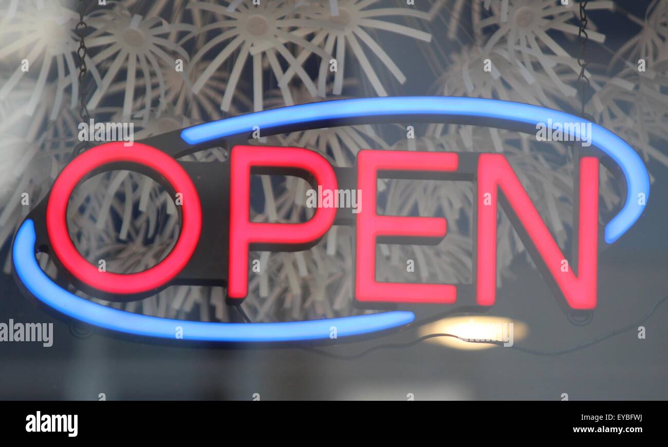 Open sign in store window Stock Photo Alamy