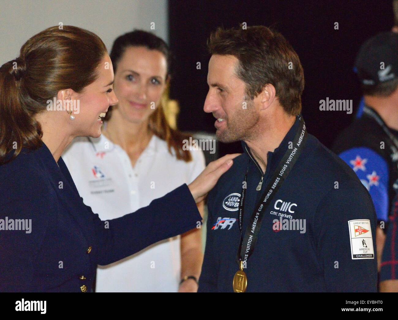 Portsmouth, Hampshire, UK. 26th July, 2015. The Duke and Duchess of Cambridge present Sir Ben Ainslie, skipper of the British 'Land Rover BAR' team with the cup for winning the Louis Vuitton America's Cup World Series Portsmouth at the official prize giving.  The cup was designed by 5 year old Leo Howard from a local school on behalf of the 1851 Trust and made by artist Michelle Littlewood Credit:  Wendy Johnson/Alamy Live News  (photographer media accredited for this event) Stock Photo
