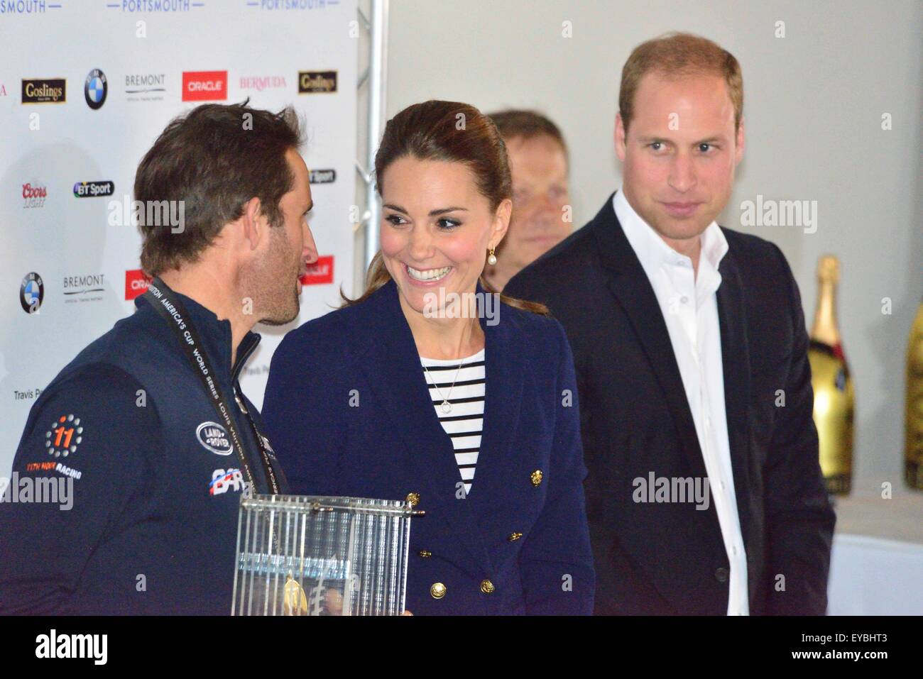 Portsmouth, Hampshire, UK. 26th July, 2015. The Duke and Duchess of Cambridge presenting the Louis Vuitton America's Cup World Series Portsmouth today 26 July 2015The Duke and Duchess of Cambridge present Sir Ben Ainslie, skipper of the British 'Land Rover BAR' team with the cup for winning the Louis Vuitton America's Cup World Series Portsmouth at the official prize giving.  The cup was designed by 5 year old Leo Howard from a local school on behalf of the 1851 Trust and made by artist Michelle Littlewood Credit:  Wendy Johnson/Alamy Live News  (photographer media accredited for this event) Stock Photo
