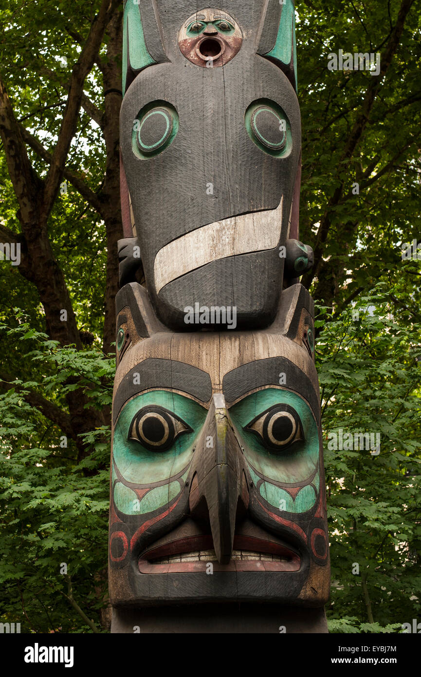 Downtown Seattle at Pioneer Square with totems, Native American Art Stock Photo