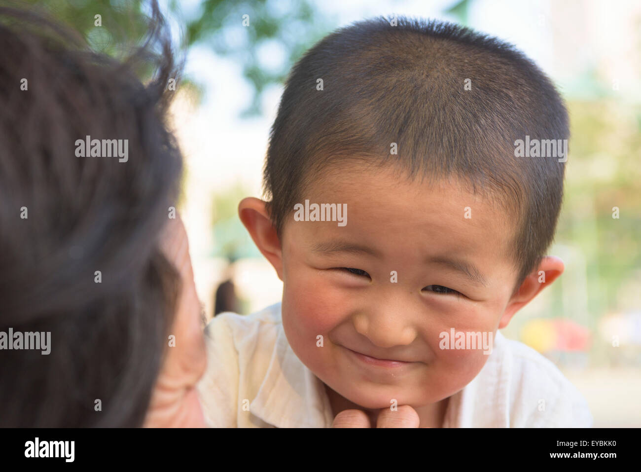 Chinese boy smiling hi-res stock photography and images - Alamy