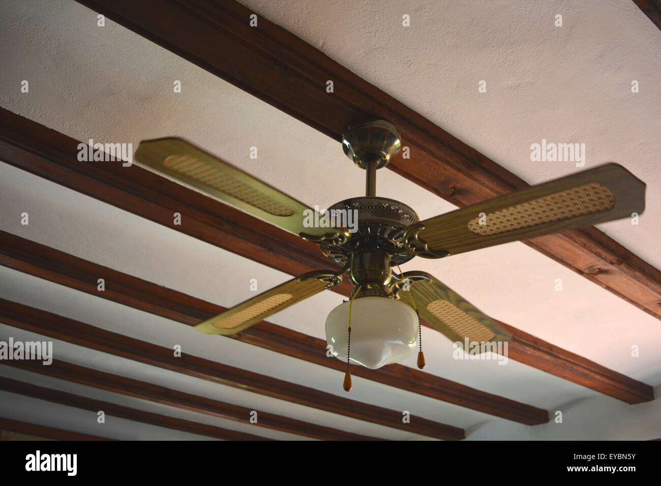 Ceiling fan with a light fitting, Spain Stock Photo