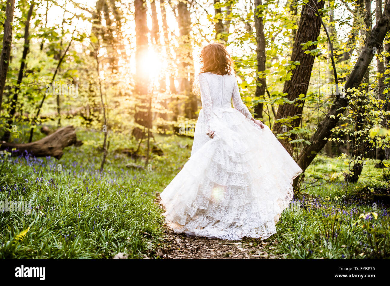 Runaway Bride A Slim Young Brown Haired Woman Wearing A White Wedding Dress Walking By Herself 