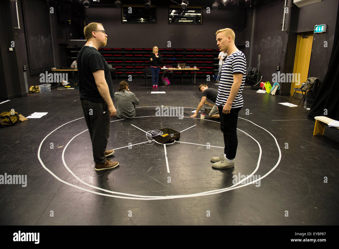 Welsh theatre director Angharad Lee directing professional actors in ...