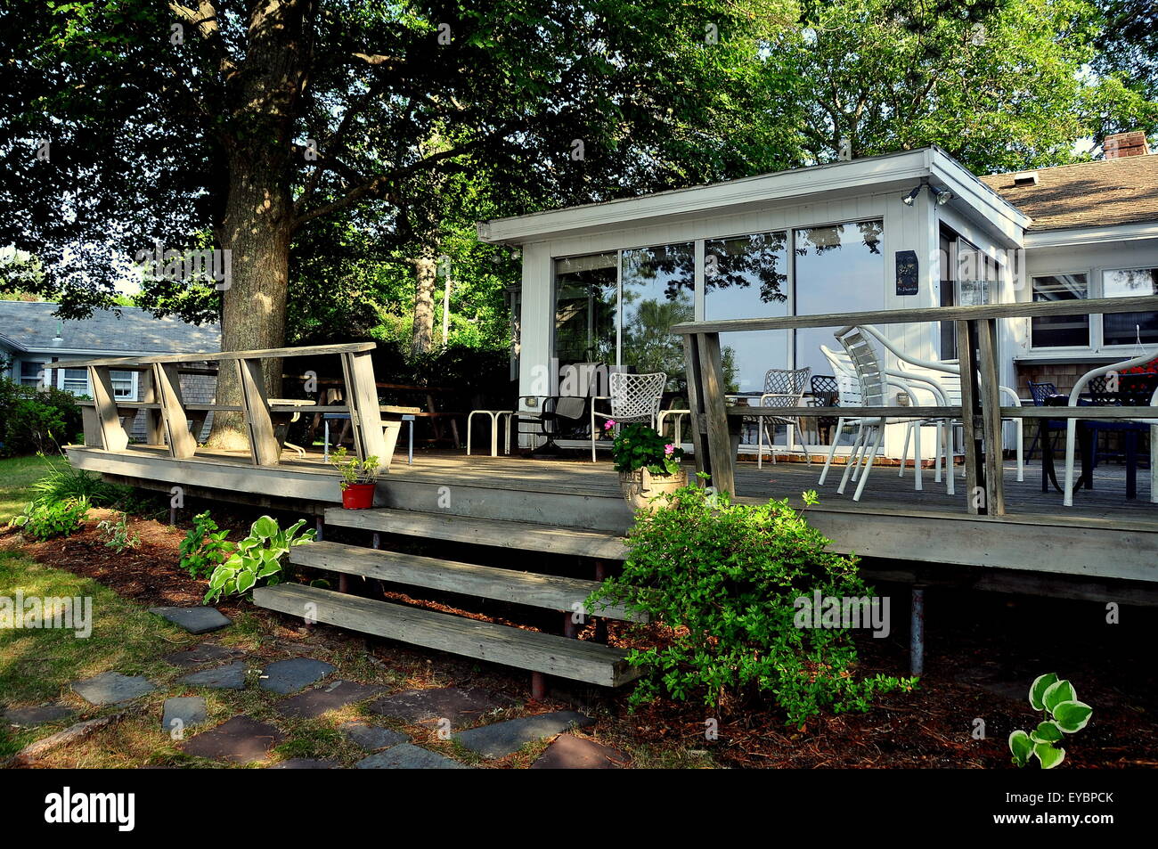 Centerville, Massachusetts Outdoor deck with chairs and sunroom of an