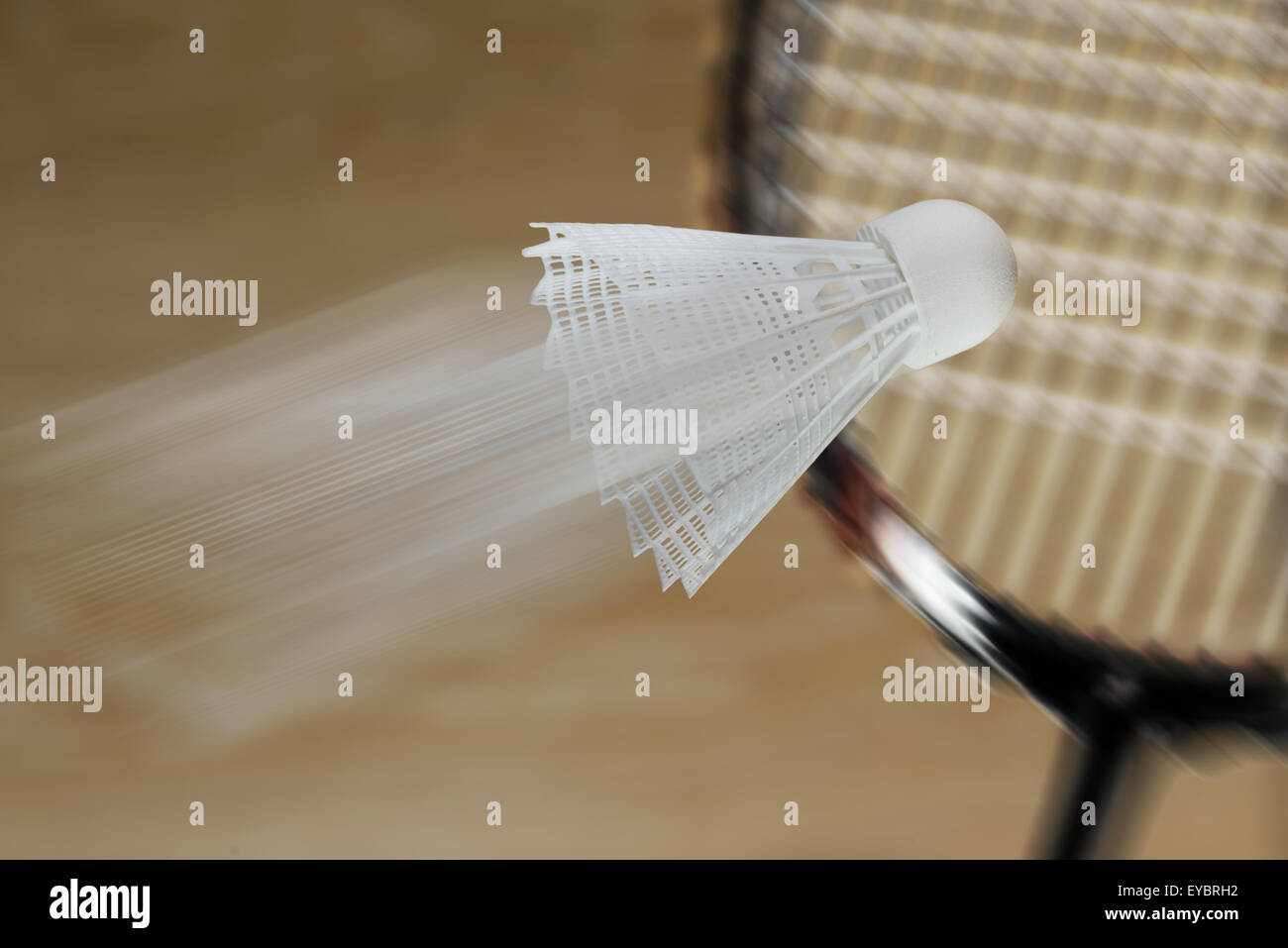 White shuttlecock and racket badminton in flight Stock Photo