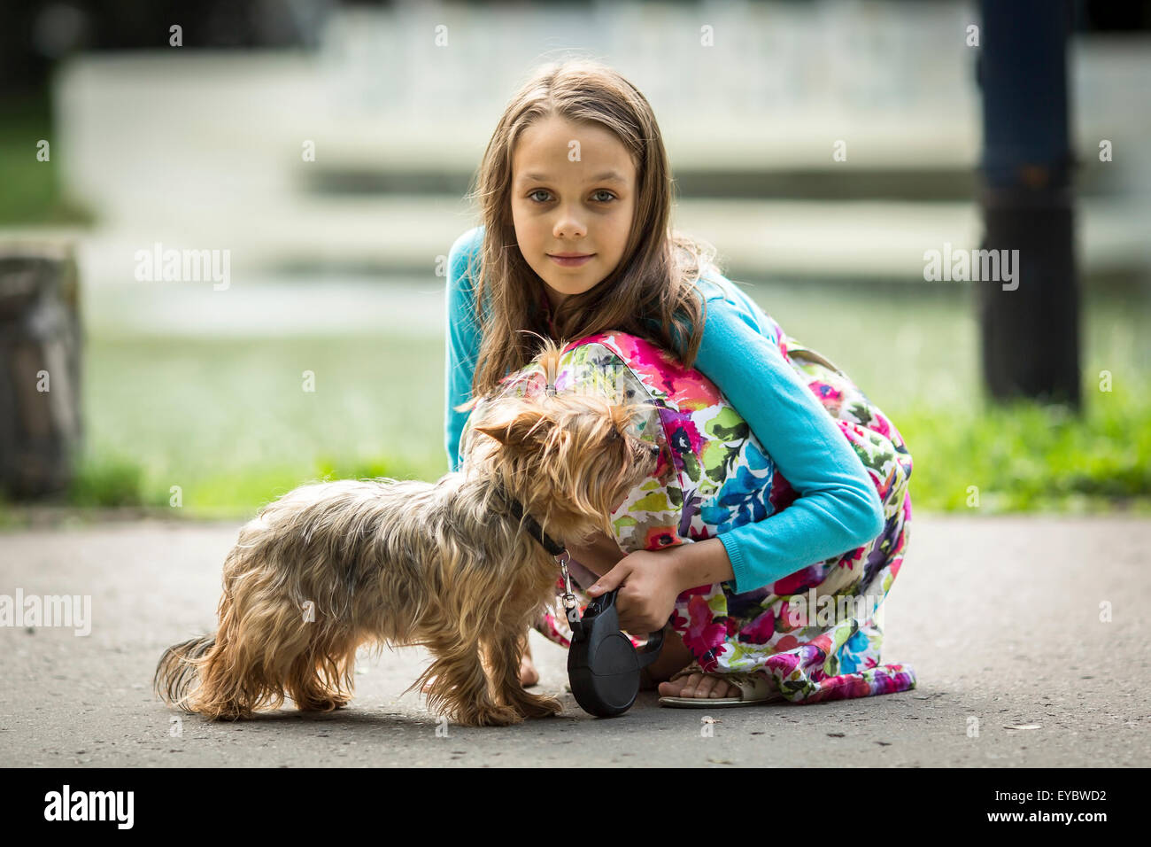 Portrait of cute little girl on a walk with her little dog Stock Photo ...