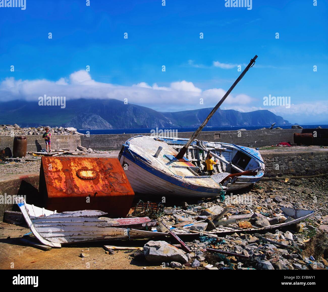 Keel Harbour, Achill Island, Co Mayo, Ireland; Storm Damaged Boat Stock