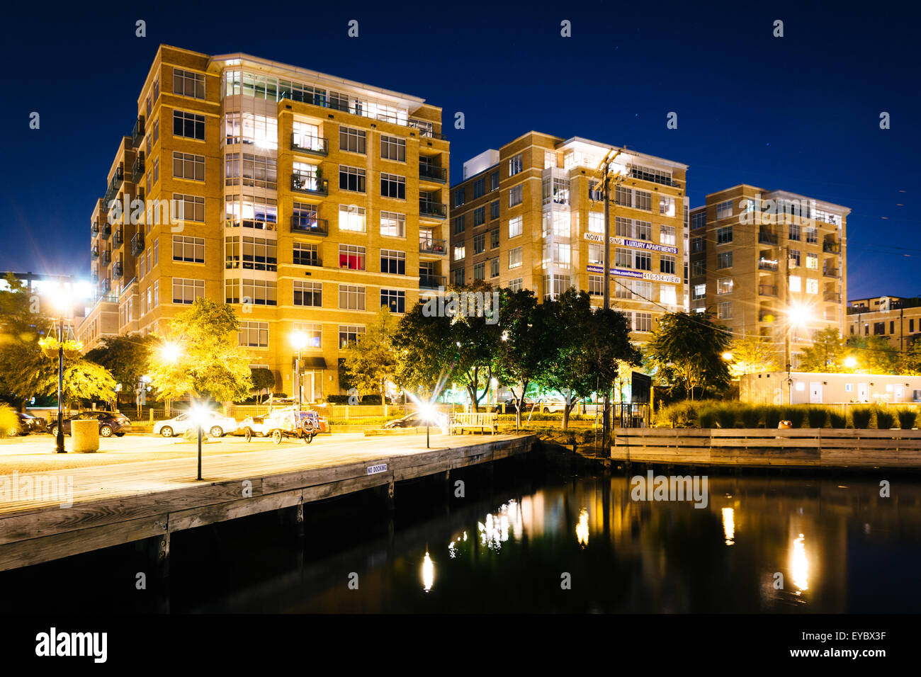 Apartment buildings at night on the waterfront in Fells Point