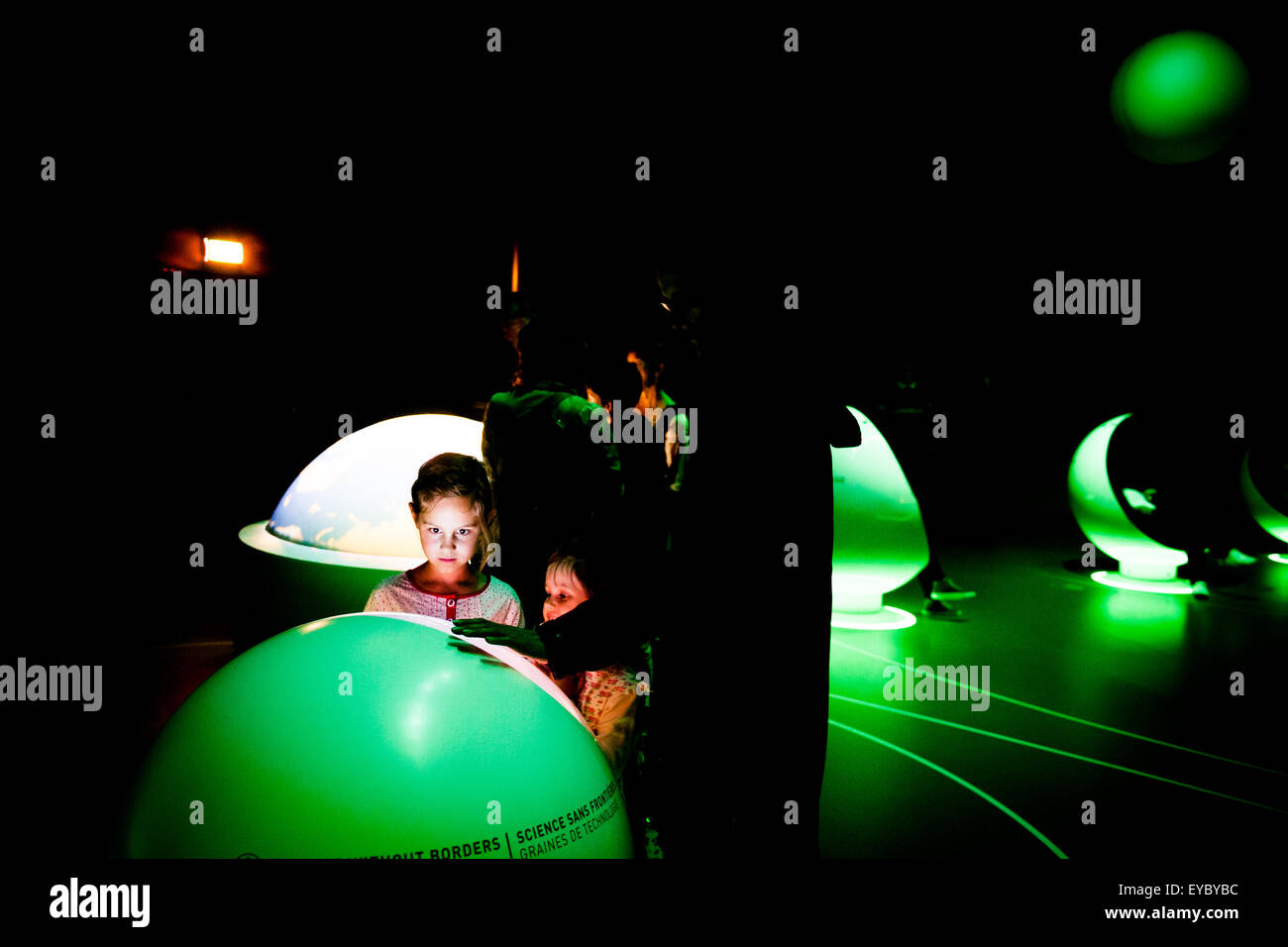 People at the CERN Visitor Centre in Geneva, Switzerland. CERN is the