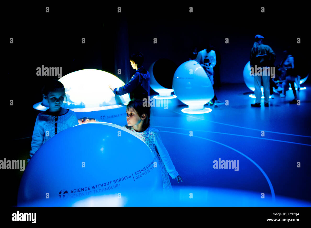 People at the CERN Visitor Centre in Geneva, Switzerland. CERN is the