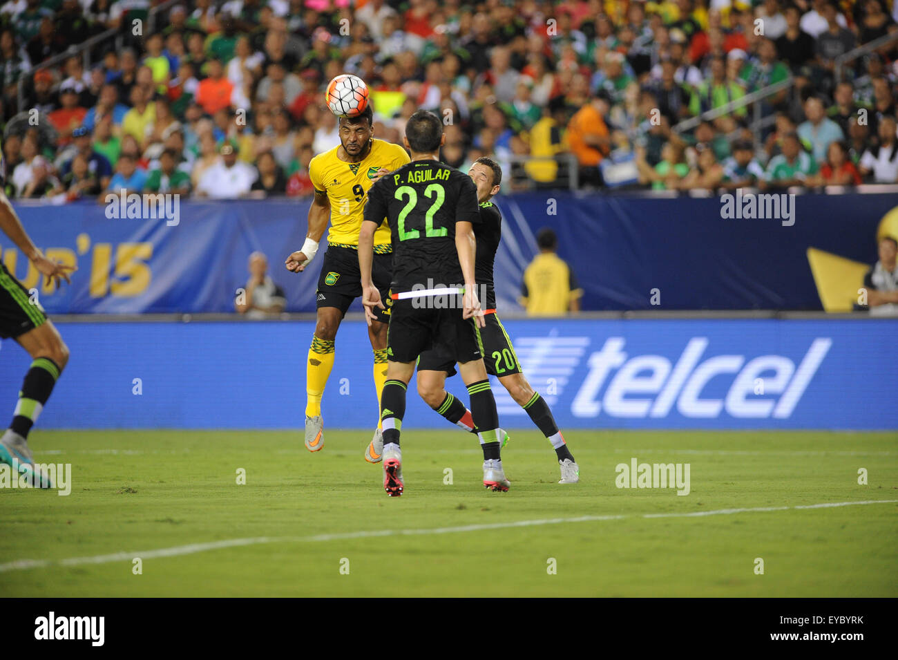 Philadelphia, Pennsylvania, USA. 26th July, 2015. Jamaica player, GILES BARNES, (9) in action against Mexico's PAUL AGUILAR (22) during the final of the Gold Cup The Gold Cup match played at Lincoln Financial Field in Philadelphia Pa (Credit Image: © Ricky Fitchett via ZUMA Wire) Stock Photo