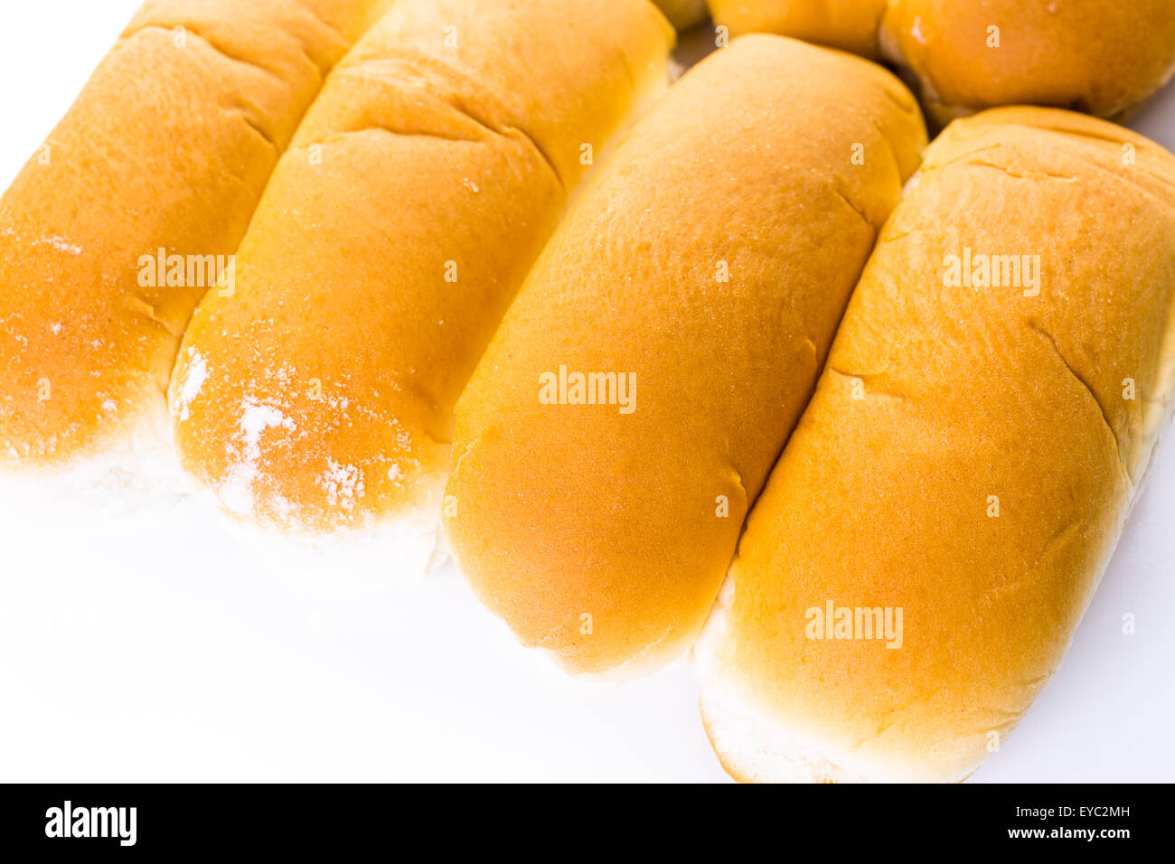 Freshly baked hot dog buns on a white background Stock Photo Alamy