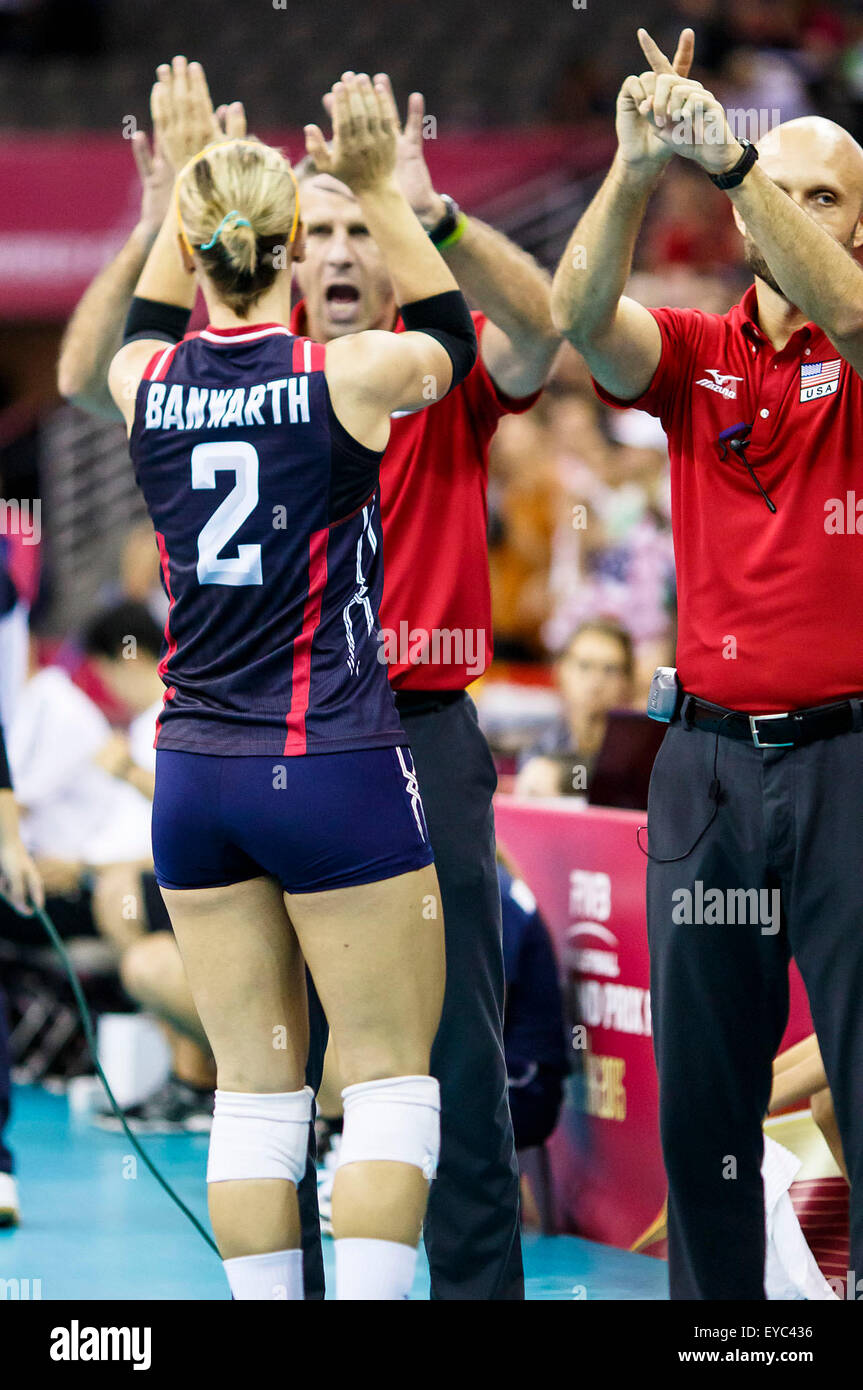 Omaha, NE USA. 26th July, 2015. United States libero Kayla Banwarth #2 high  fives head coach Karch Kiraly before the start of their 2015 FIVB Women's  Volleyball World Grand Prix Finals match