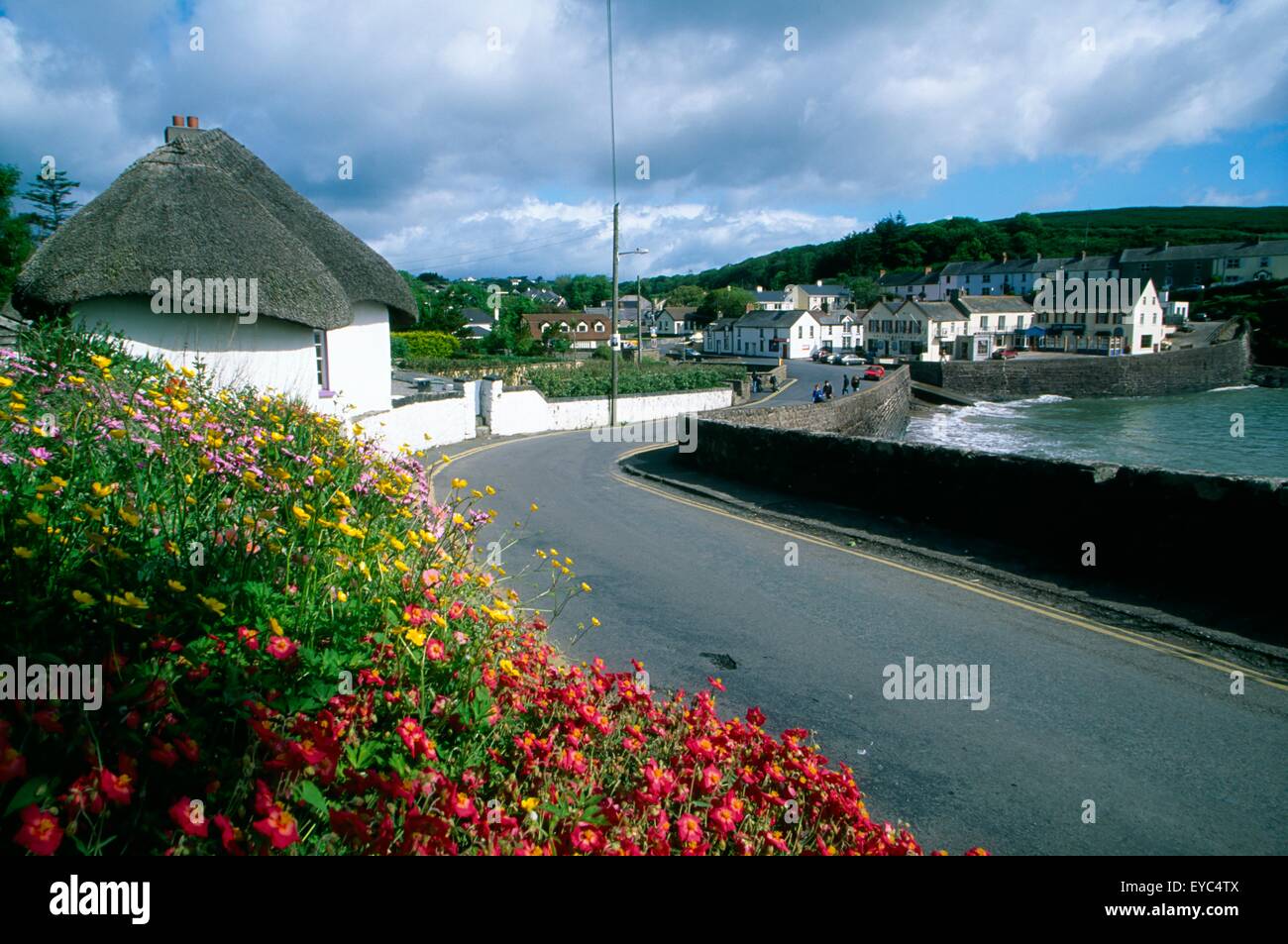 Dunmore East, County Waterford, Ireland; Thatched Cottage By The Sea