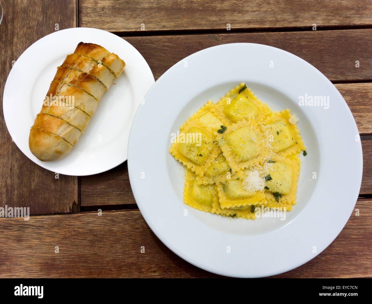 Pub Lunch Ravioli Pasta filled with spinach and Ricotta cheese with flaked Parmesan and garlic