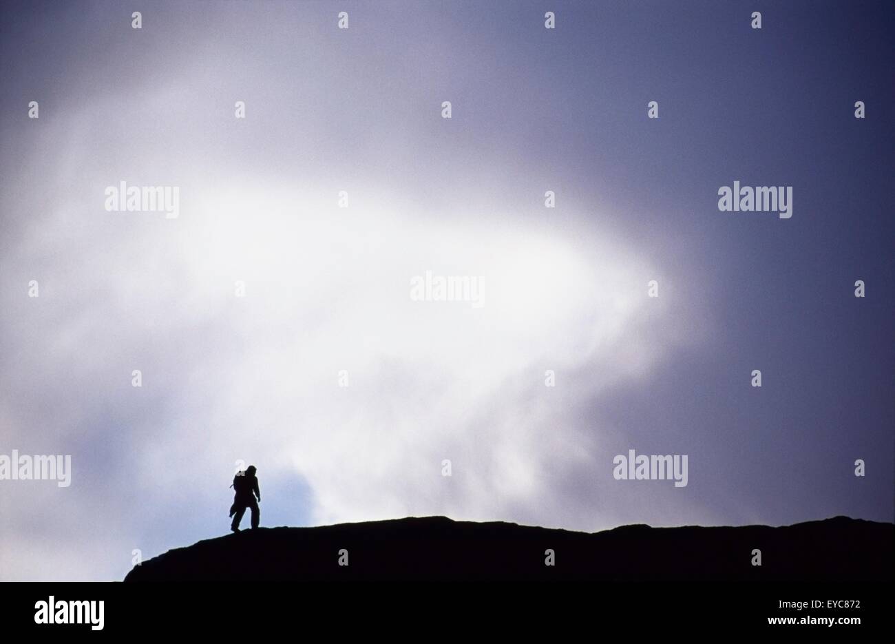 Person Silhouetted On Tully Mountain, Connemara, County Galway, Ireland Stock Photo