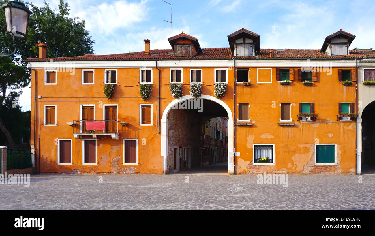 orange color old charming building in Venice, Italy Stock Photo