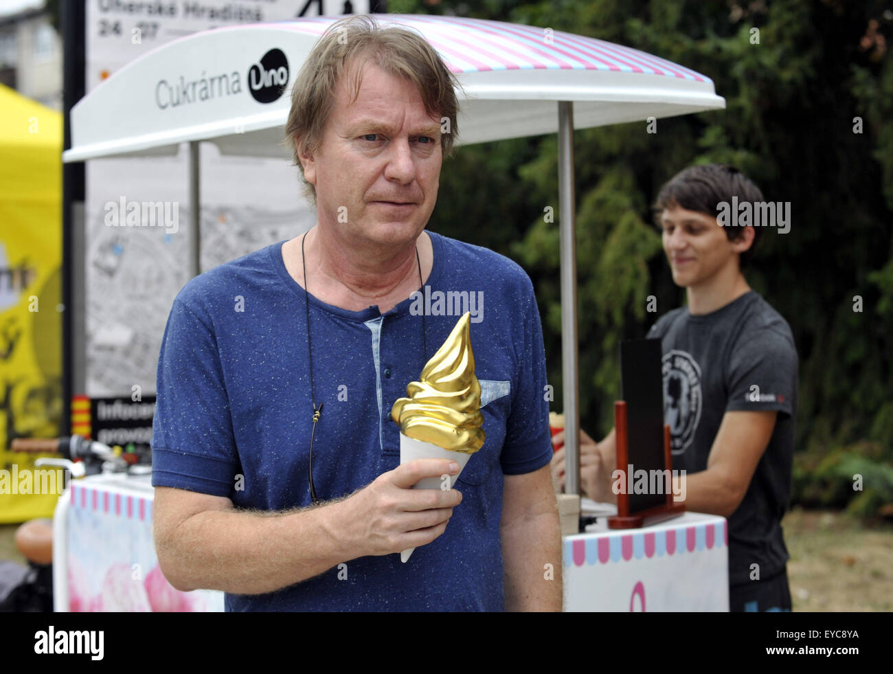 Finnish film director Mika Kaurismaki poses by the ice cream stand with