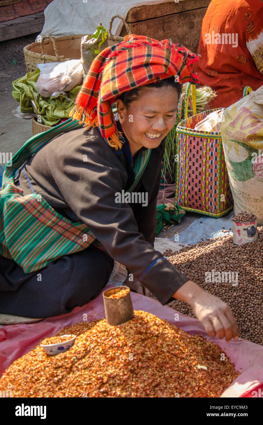 Smiling Shan Lady selling Pulses at Market, Lake Inle, Myanmar Stock Photo