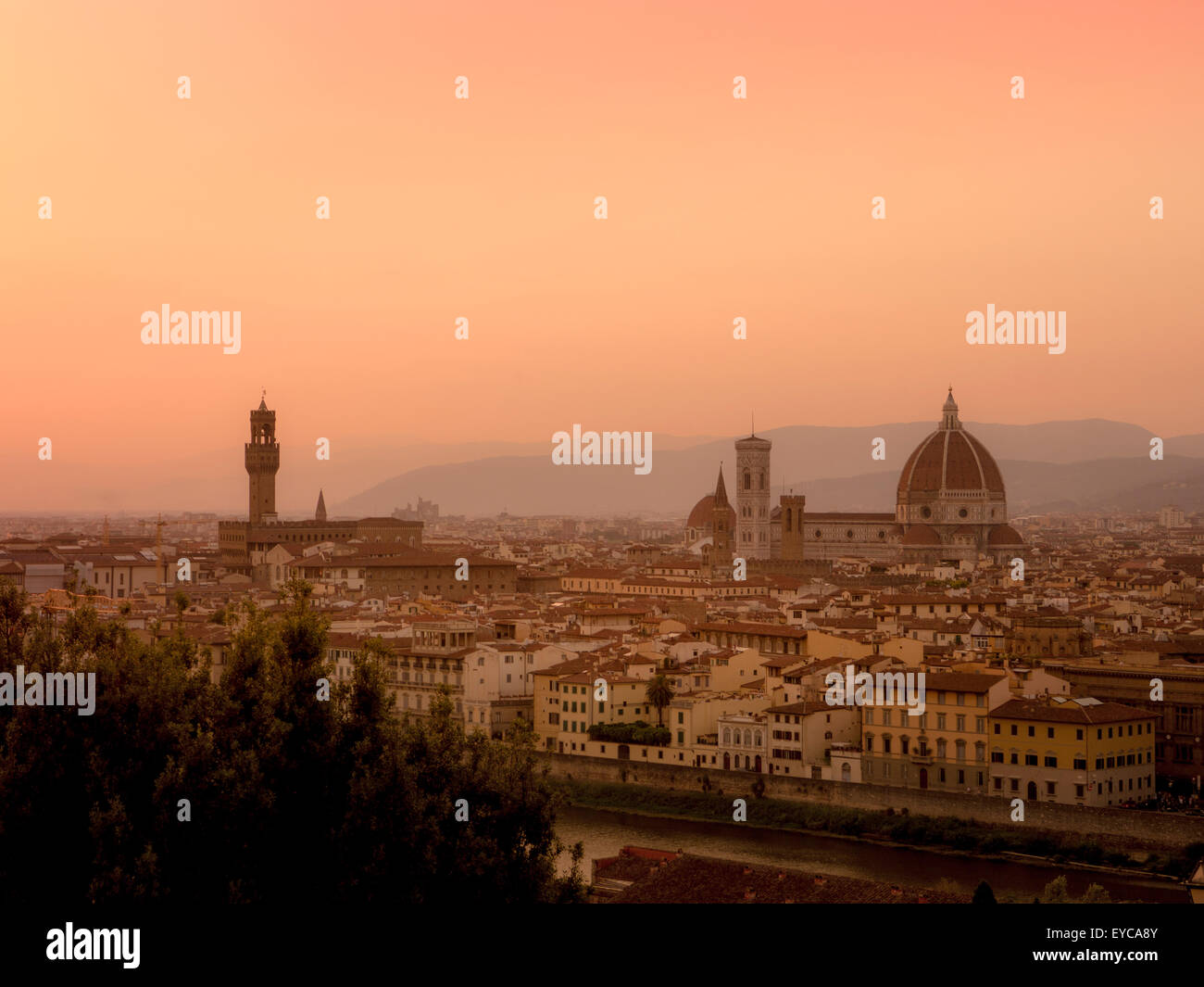 Florence Cathedral at dusk, seen from the south bank of the river Arno. Florence, Italy Stock