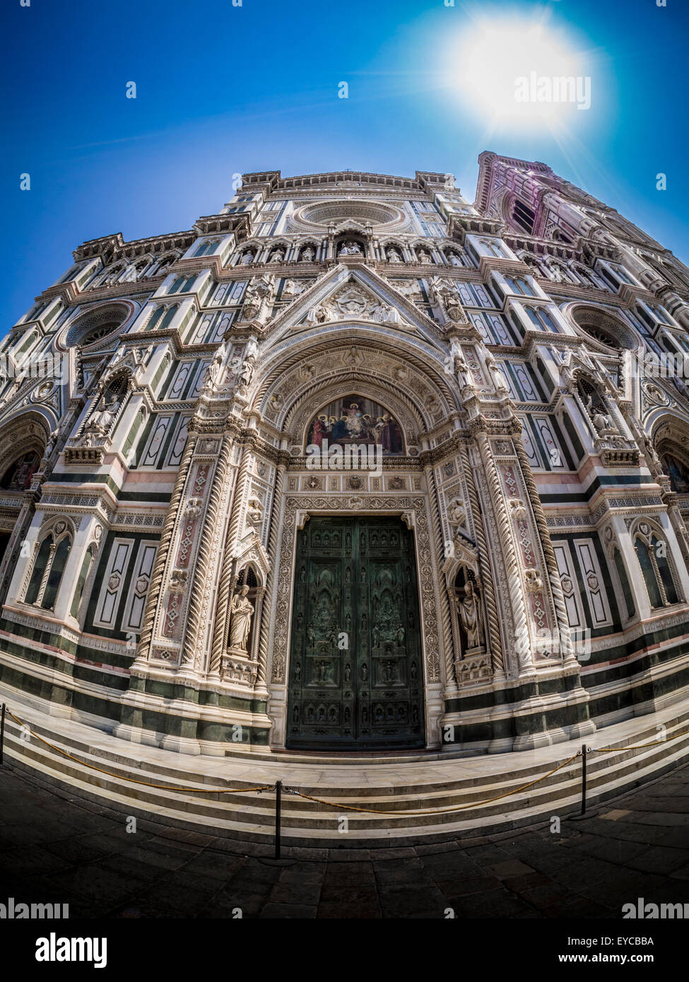 Fisheye lens shot of exterior of west front entrance of Florence Cathedral - The Cattedrale di Santa Maria del Fiore. Florence. Italy. Stock Photo