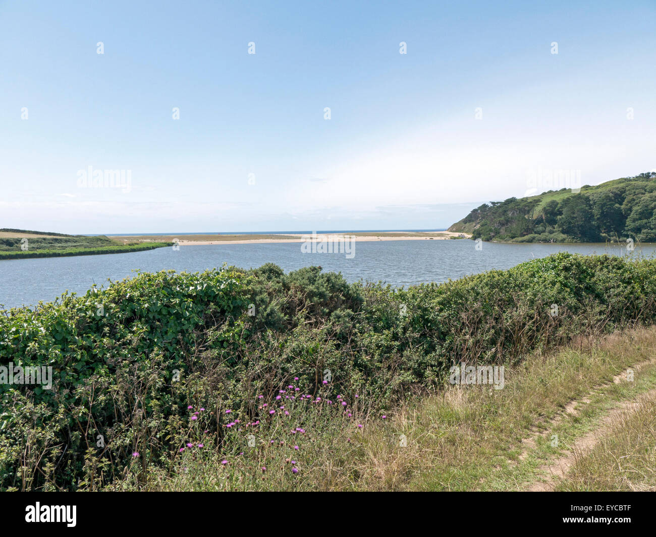 Loe Pool, with Loe Bar in background and the Atlantic sea beyond Stock Photo