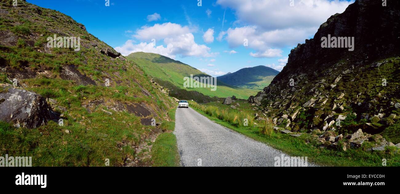 Car Driving Along Narrow Mountain Road Stock Photo Alamy