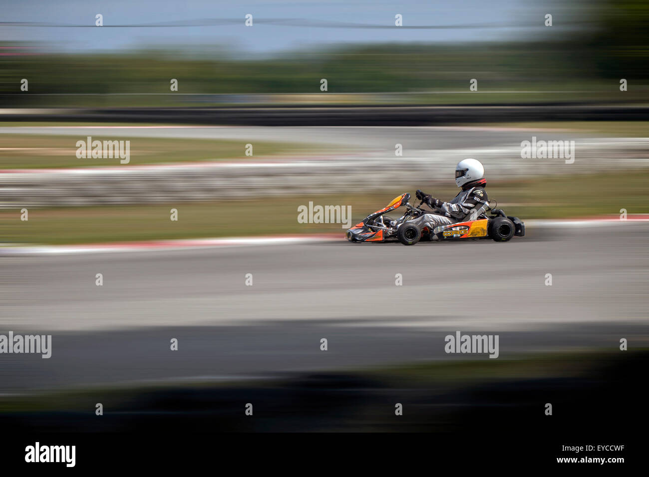 Go-Kart racing action at full speed. Blur and motion, panning technique Stock Photo