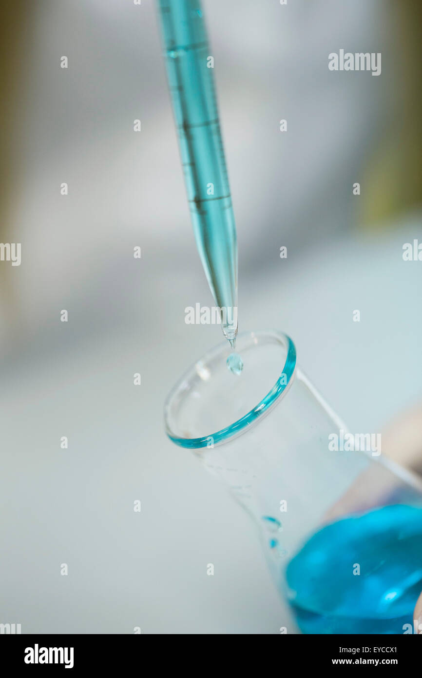 Pipetting sample into test tube, closeup Stock Photo Alamy