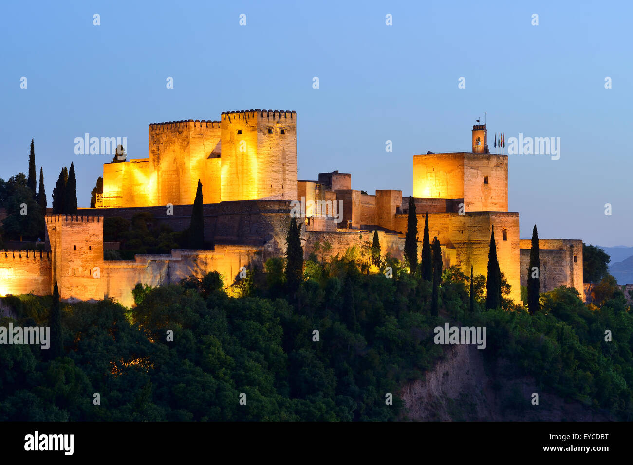 View of Alcazaba towers at dusk within the Alhambra Palace complex in Granada, Andalusia, Spain Stock Photo