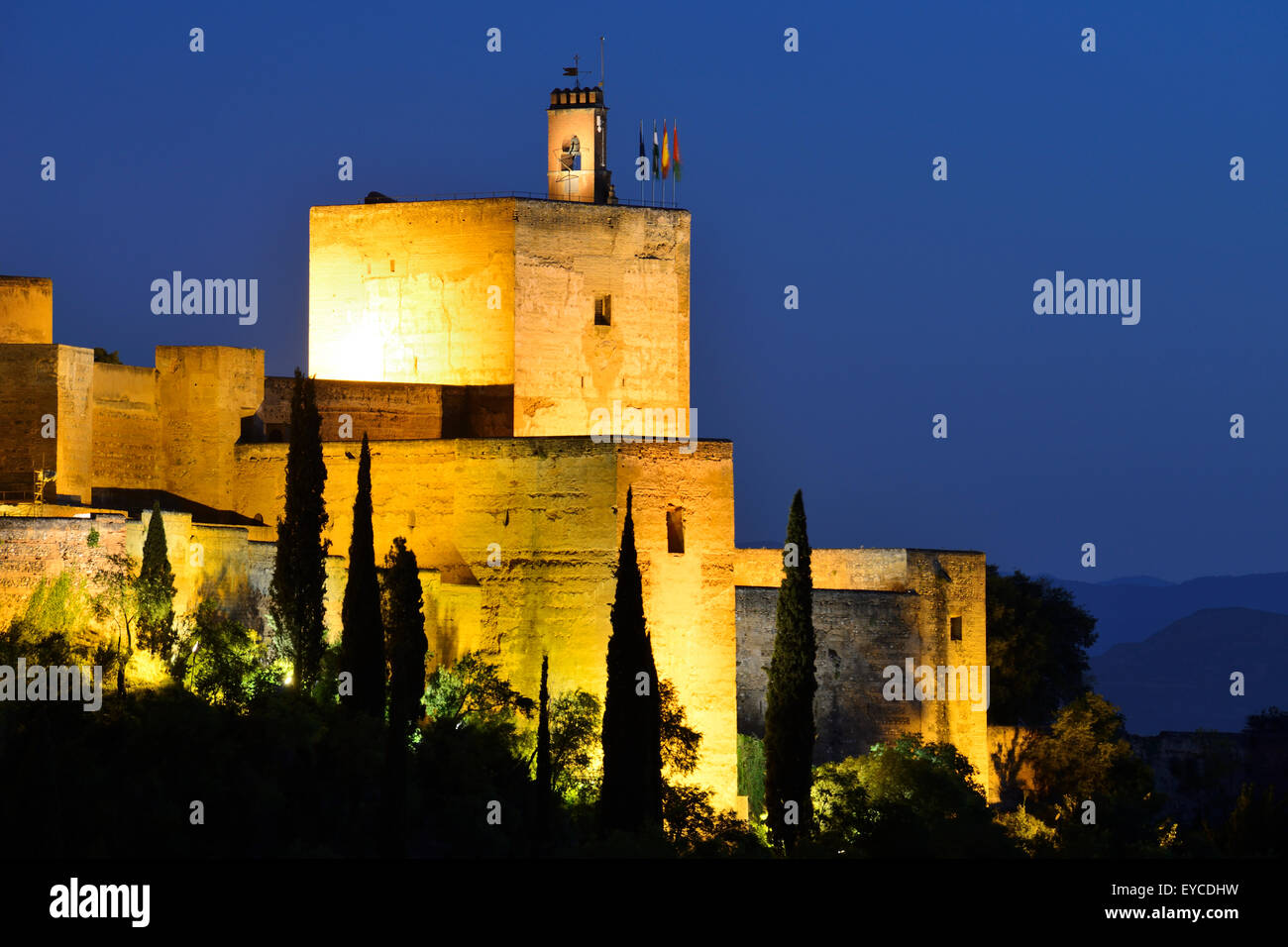 View of Alcazaba towers at dusk within the Alhambra Palace complex in Granada, Andalusia, Spain Stock Photo