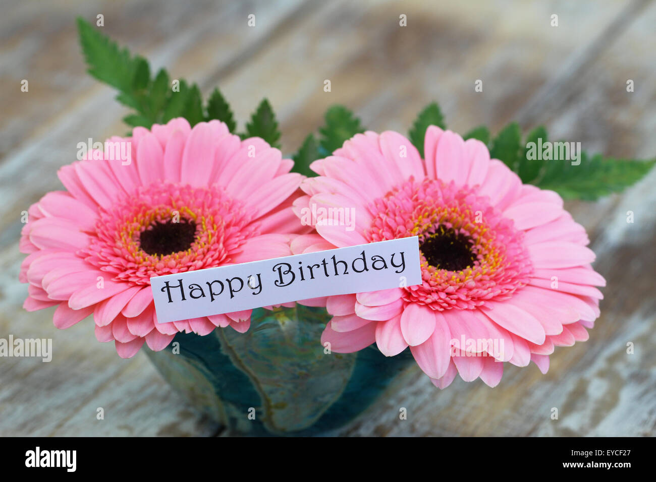 Happy birthday card with pink gerbera daisies Stock Photo Alamy