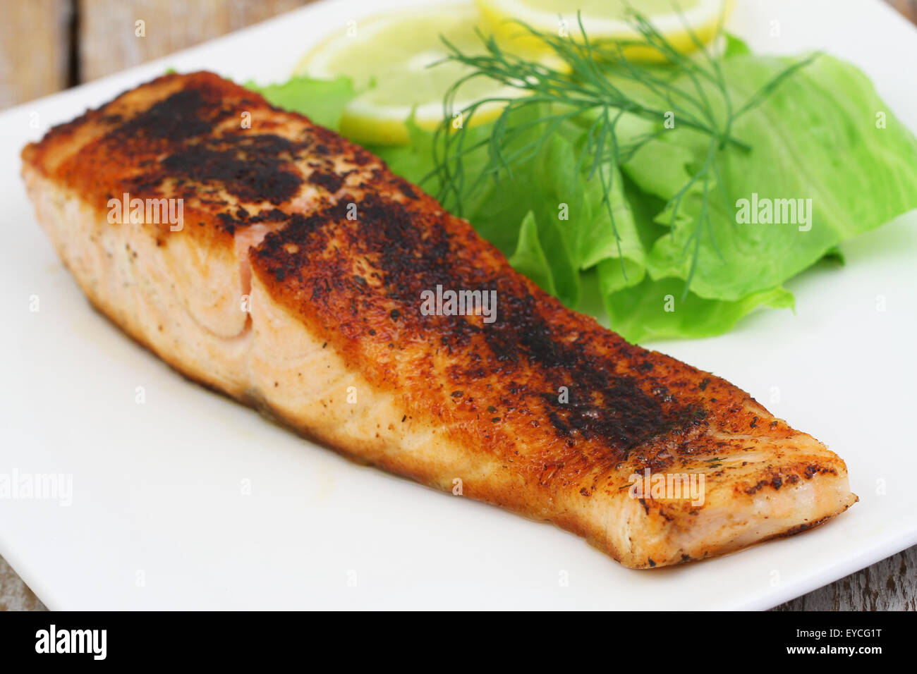 Grilled salmon with side salad, closeup Stock Photo